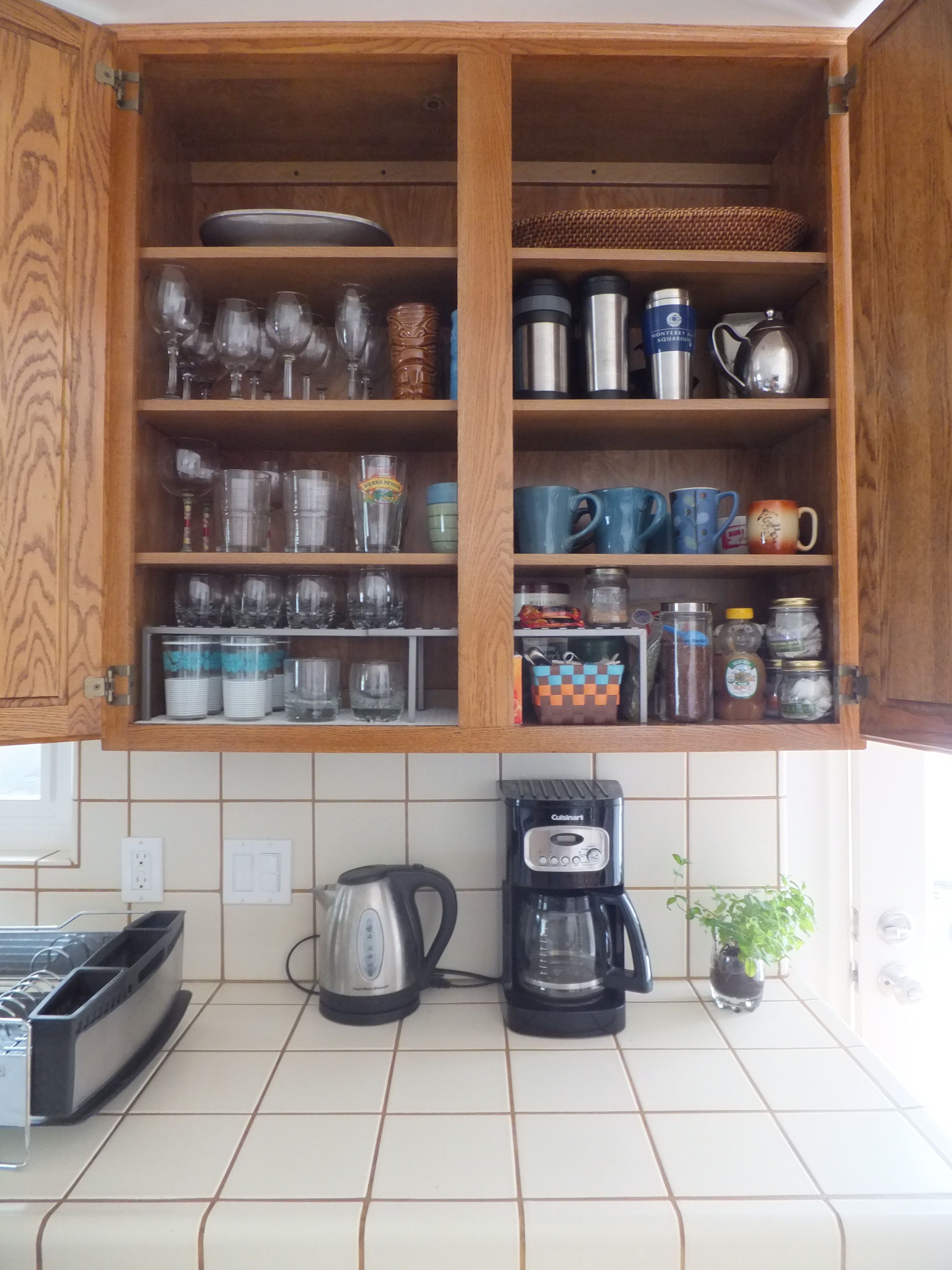 https://149453710.v2.pressablecdn.com/wp-content/uploads/2013/04/bella-kitchen-organizing-drink-cabinet-1.jpg