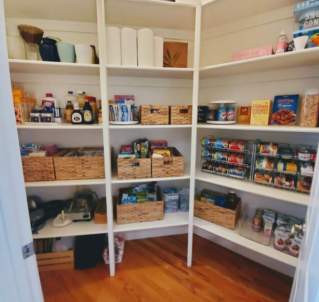 kitchen unpack walk in pantry brown natural weave baskets from container store Bella Organizing Professional home organizers and residential packing and moving management company serving the San Francisco Bay Area.