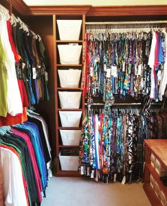 Womens Walk-in Colorful Hanging Clothing and Wardrobe Closet with canvas fabric baskets and brown shelf by Bella Organizing Professional Home Organizers in Oakland and San Francisco Bay Area