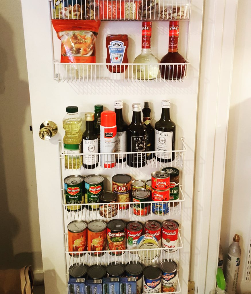pantry food storage over the door hanging shelves from container store Bella Organizing Professional home organizers and residential packing and moving management company serving the San Francisco Bay Area.