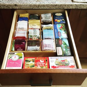 bamboo tea drawer in the kitchen Bella Organizing Professional home organizers and residential packing and moving management company serving the San Francisco Bay Area.
