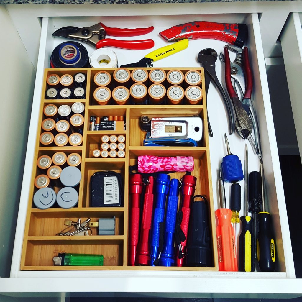 Utility and Junk drawer wood bamboo storage for batteries and hand tools screwdrivers in the garage by Bella Organizing Professional Home Organizers in Oakland and the San Francisco Bay Area